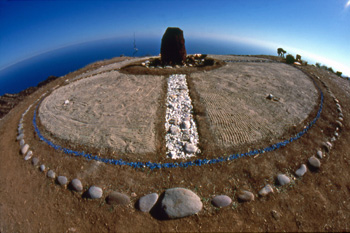 Earth Wheel — a circle of gathered stones on a precipice overlooking the Pacific Ocean, Malibu