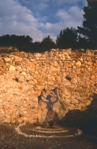 Woman of Space Pregnant with Sun — carved stone figure in Alicante, Spain